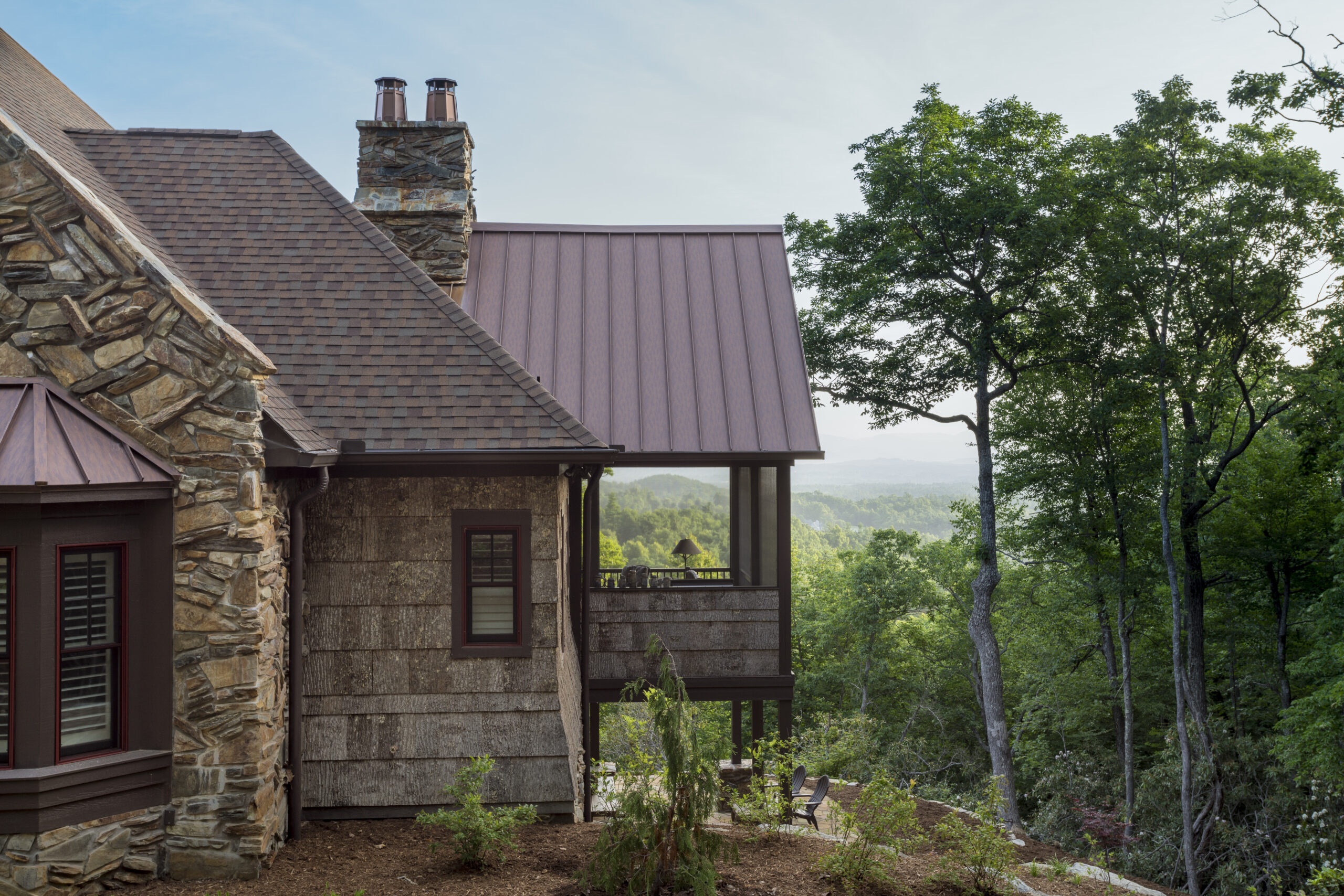 Residential exterior with natural poplar bark siding
