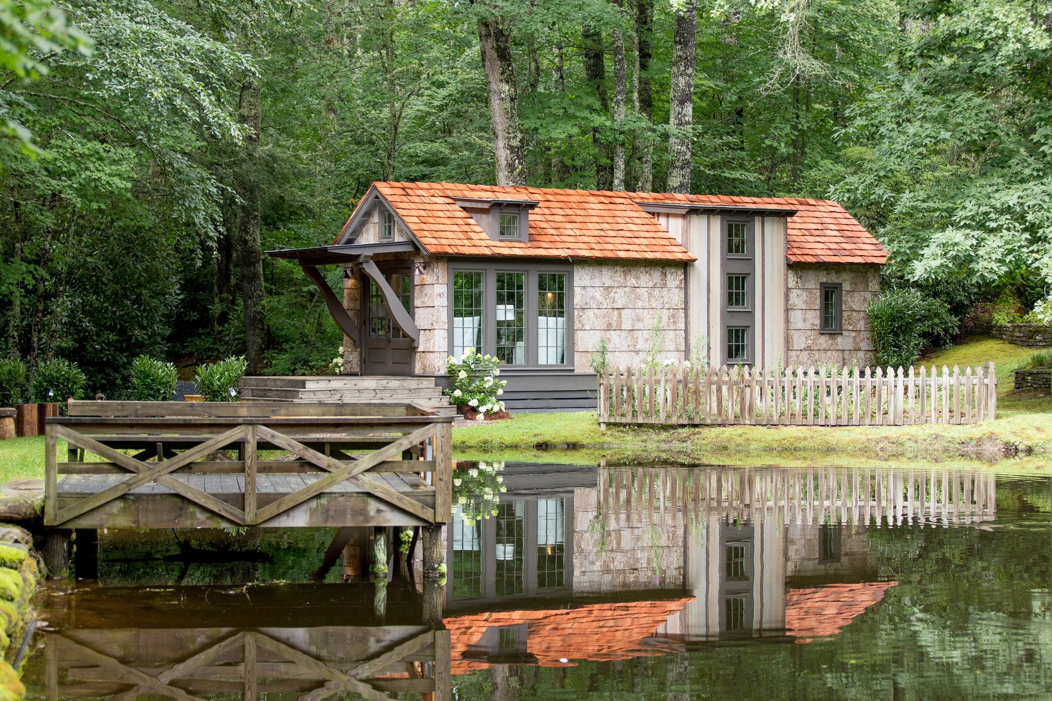 Luxury exterior project featuring thick natural poplar bark siding